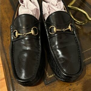 Men’s size 12 Gucci shoes preowned. These shoes have a lot of life left.